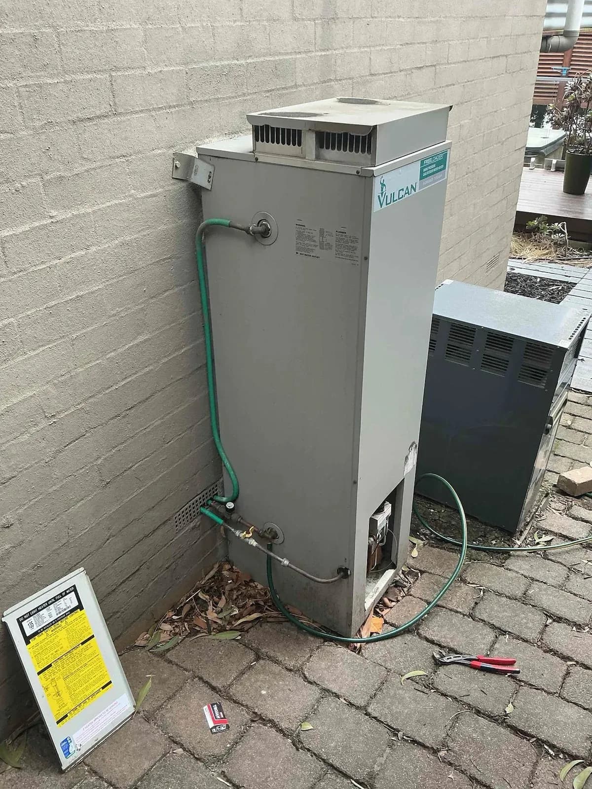 Old gas storage hot water unit that had burst