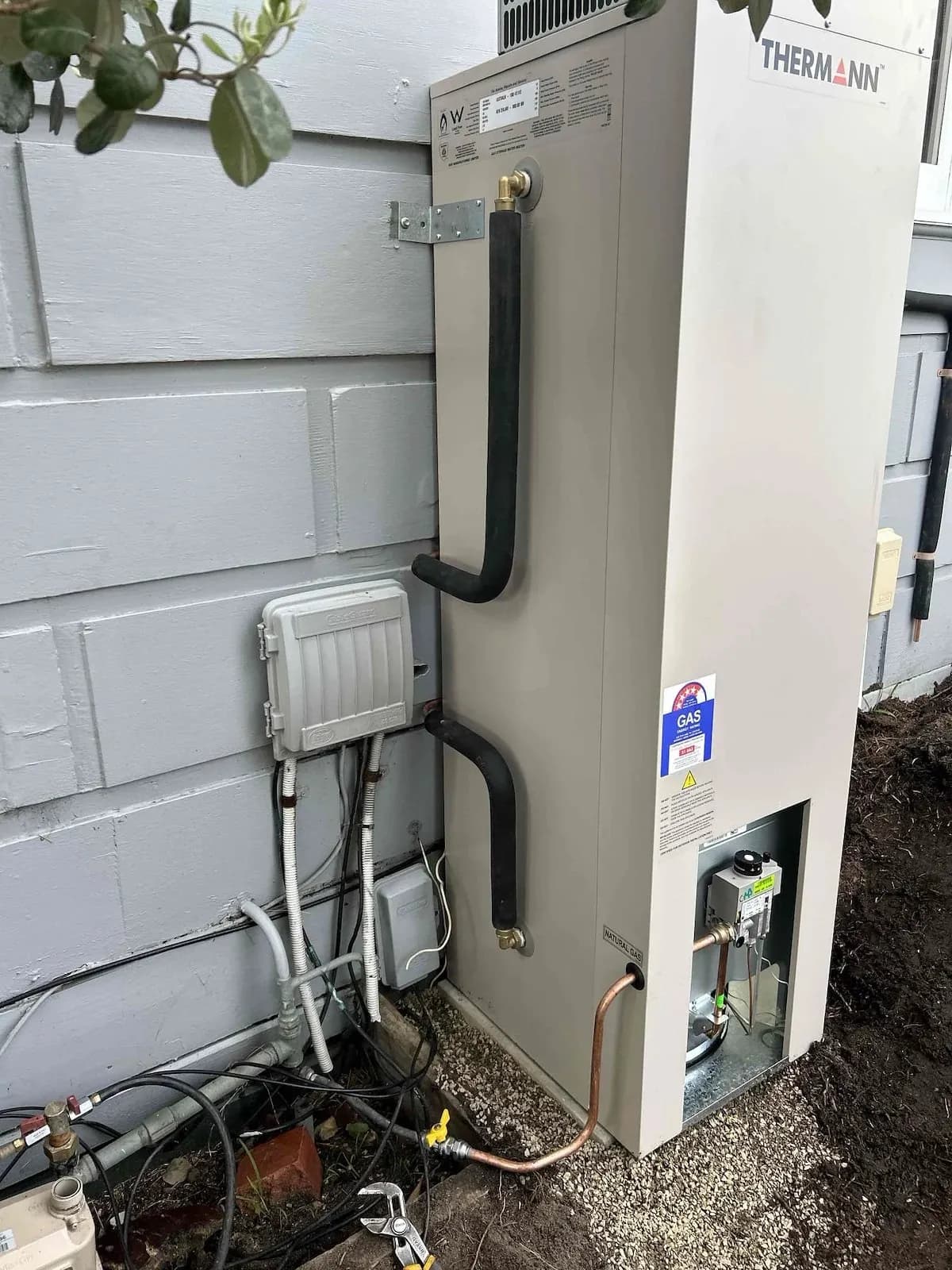 New gas hot water unit installed on a new slab