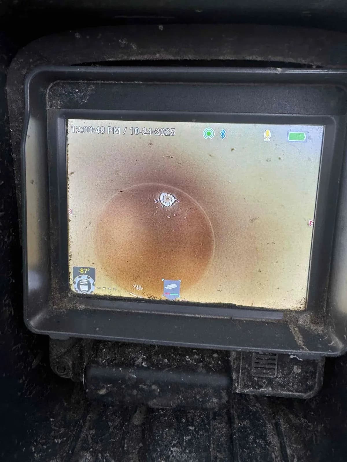 Drain camera inside the toilet line