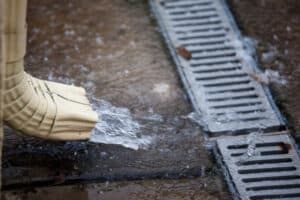 Rain water rushing into a drain